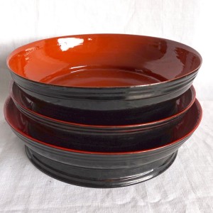 red and black lacquerware bowls