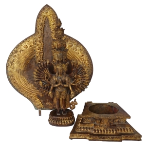 Detail of vintage padmapani avalokiteshvara, Tibetan deity made of copper with gold dust.