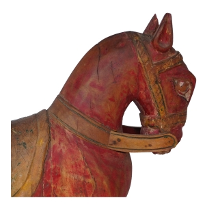 red painted wooden horse